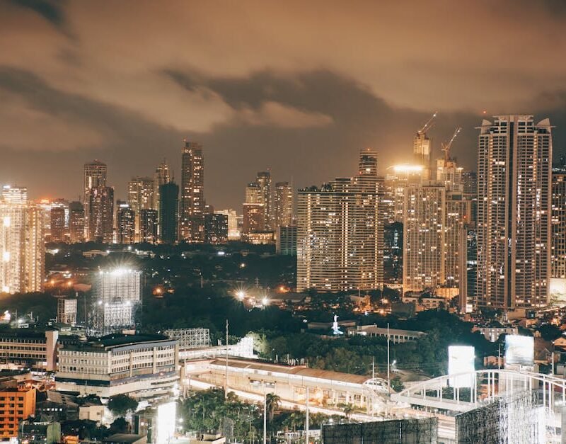 City Architecture - Illuminated cityscape at dusk showcasing modern #18048284