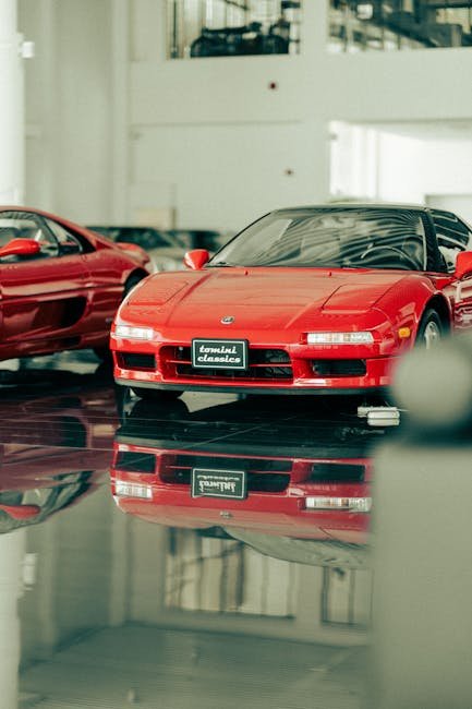 Luxury Cars - Elegant red sports car displayed in a luxury car #18434005
