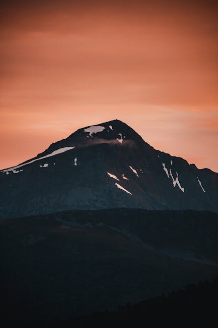 Mountain Landscapes - Stunning silhouette of a snow-capped mountain un #2669167