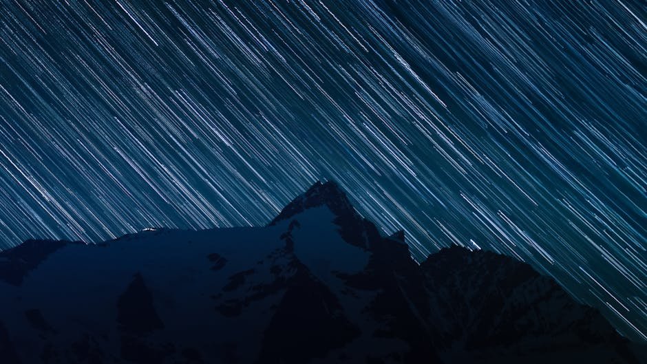 Mountain Landscapes - Captivating long exposure of star trails above s #33571214