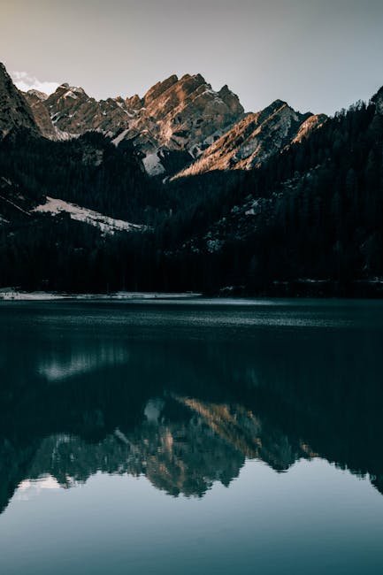 Mountain Landscapes - Tranquil mountain landscape with lake reflection #7115470
